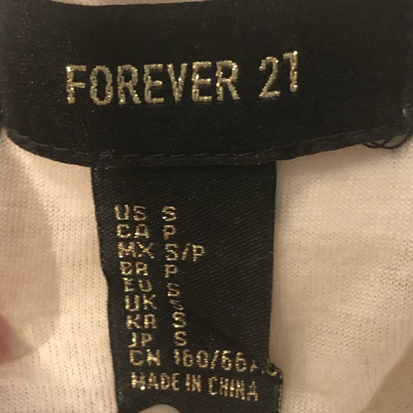 Forever 21 
White laced miniskirt - Picture 2 of 2